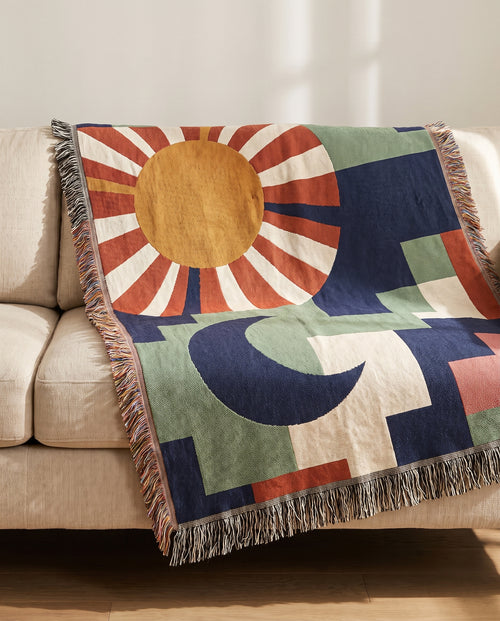Day & Night throw draped over a linen sofa